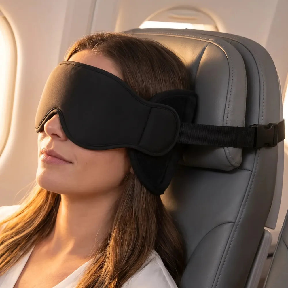 Illustrative scene of the travel sling worn against an airplane headrest